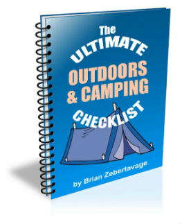 A spiral bound book with the words " the ultimate outdoors & camping checklist ".